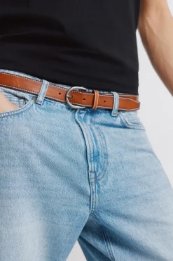 Ceinture effet cuir surpiqu&eacute;e
