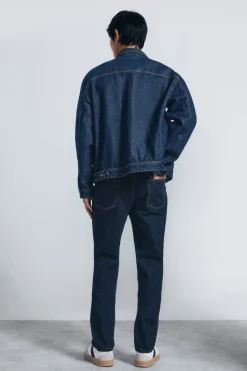 Jeans slim d&eacute;sencoll&eacute;
