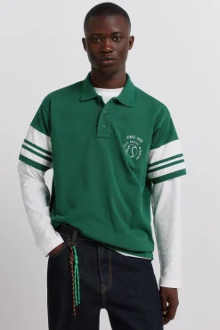Polo en piqué à manches à blocs de couleur contrastants coupe droite
