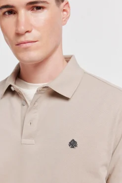 Polo en piqu&eacute; coupe slim &agrave; poignets contrastants