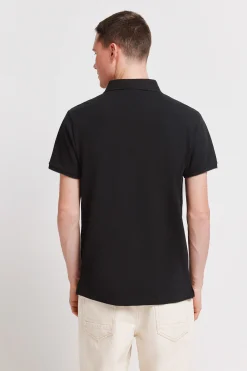 Polo en piqu&eacute; coupe slim &agrave; poignets contrastants
