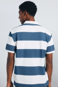 Polo piqu&eacute; coupe classique &agrave; larges rayures