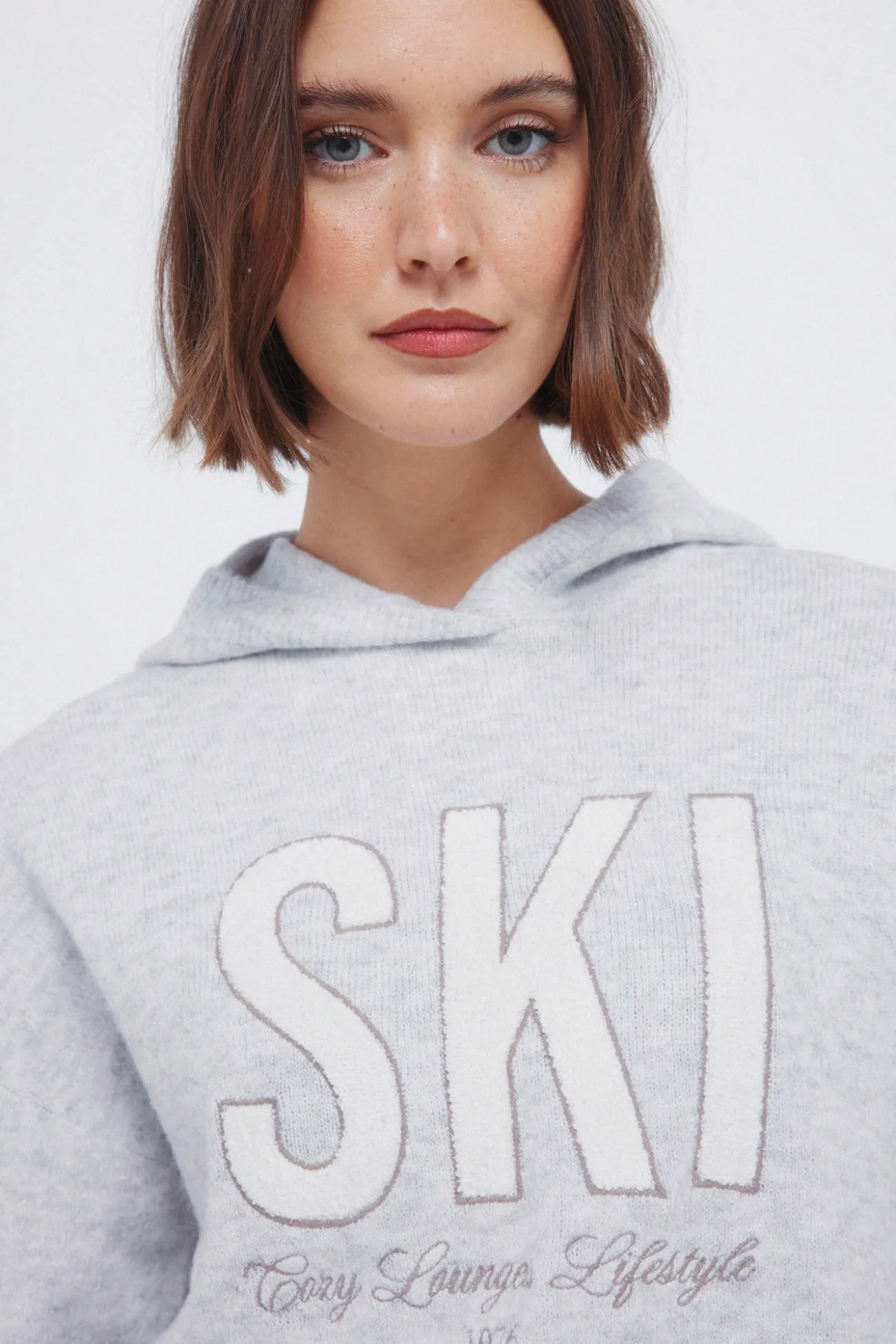 Pull à capuche « Ski »