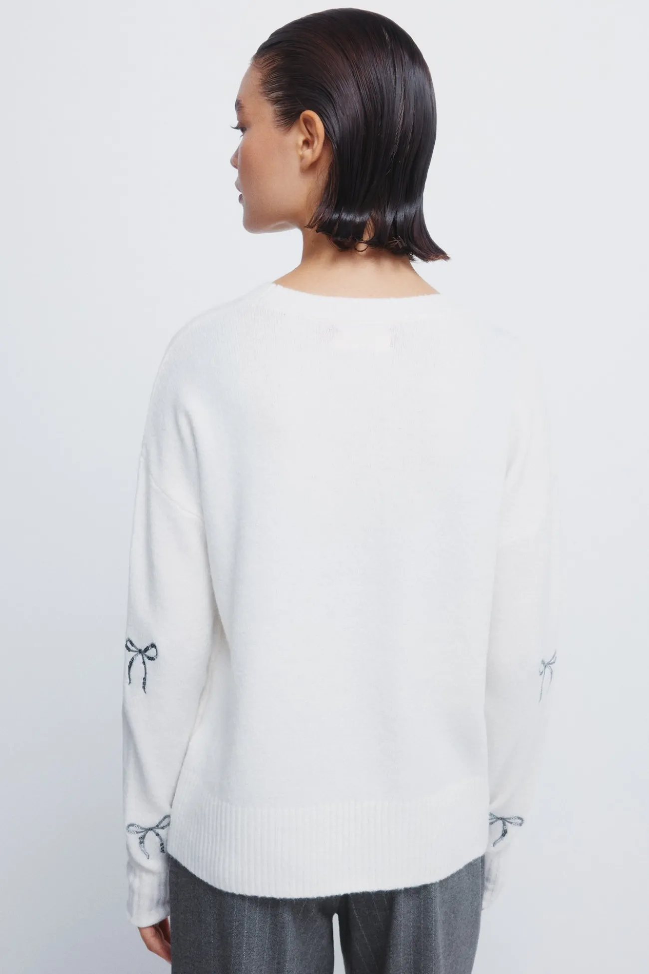 Pull avec nœuds à paillettes