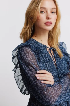 Robe courte &agrave; manches longues &agrave; volants